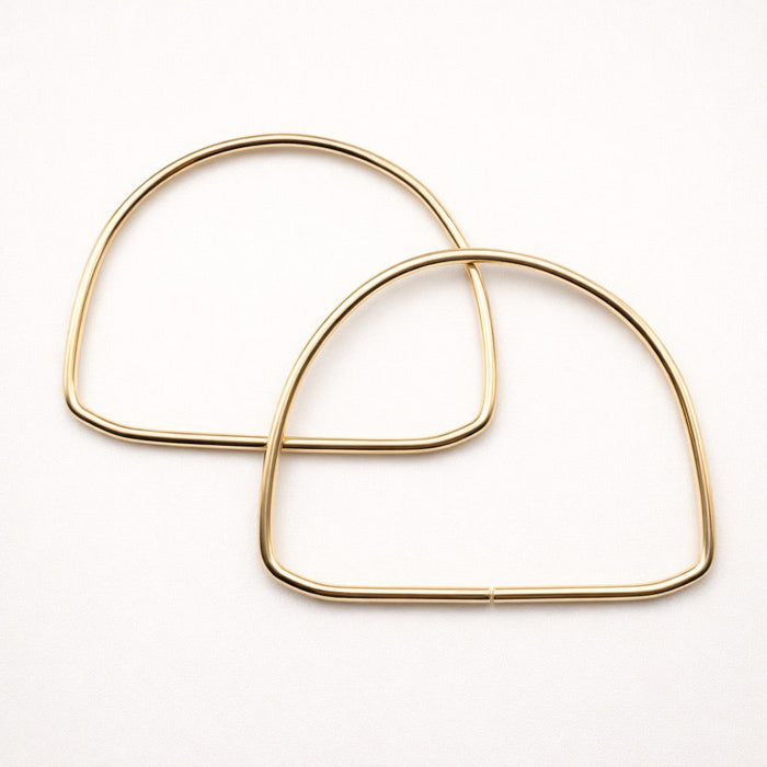 Asas semicircular metálicas doradas – 14 cm (par)