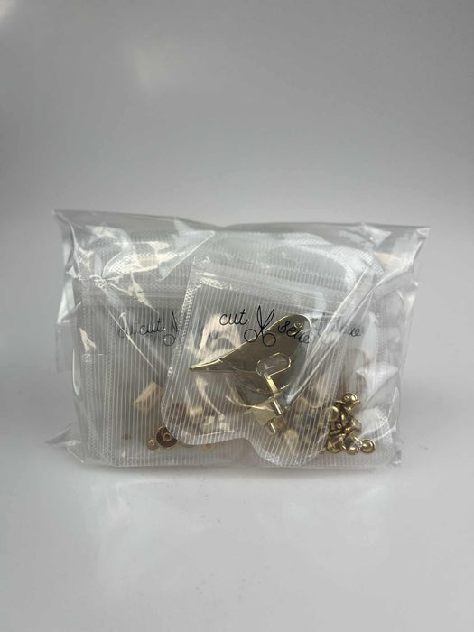 SURPRISE VÄSKPAKET HÅRDVARA - GOLD